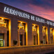 Exterior of Málaga Airport and Marbella property buyers arriving to the Costa del Sol at sunset.