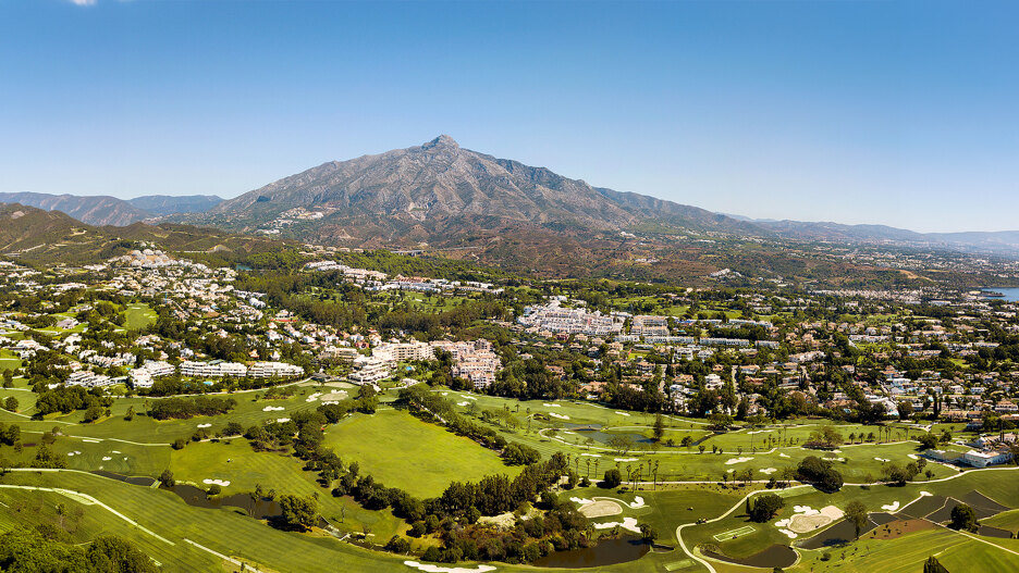Panoramic view of Nueva Andalucía’s Golf Valley with La Concha mountain rising behind Marbella