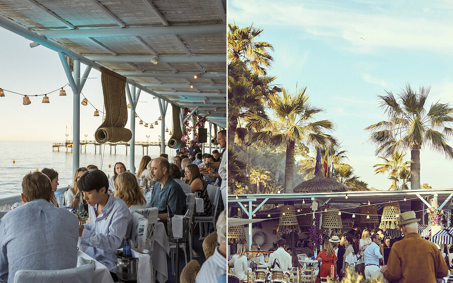 Seafront beach restaurant in Marbella with diners, palm trees and a relaxed summer atmosphere by the sea.