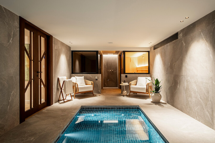 Private plunge pool and sauna relaxation area in a luxury villa