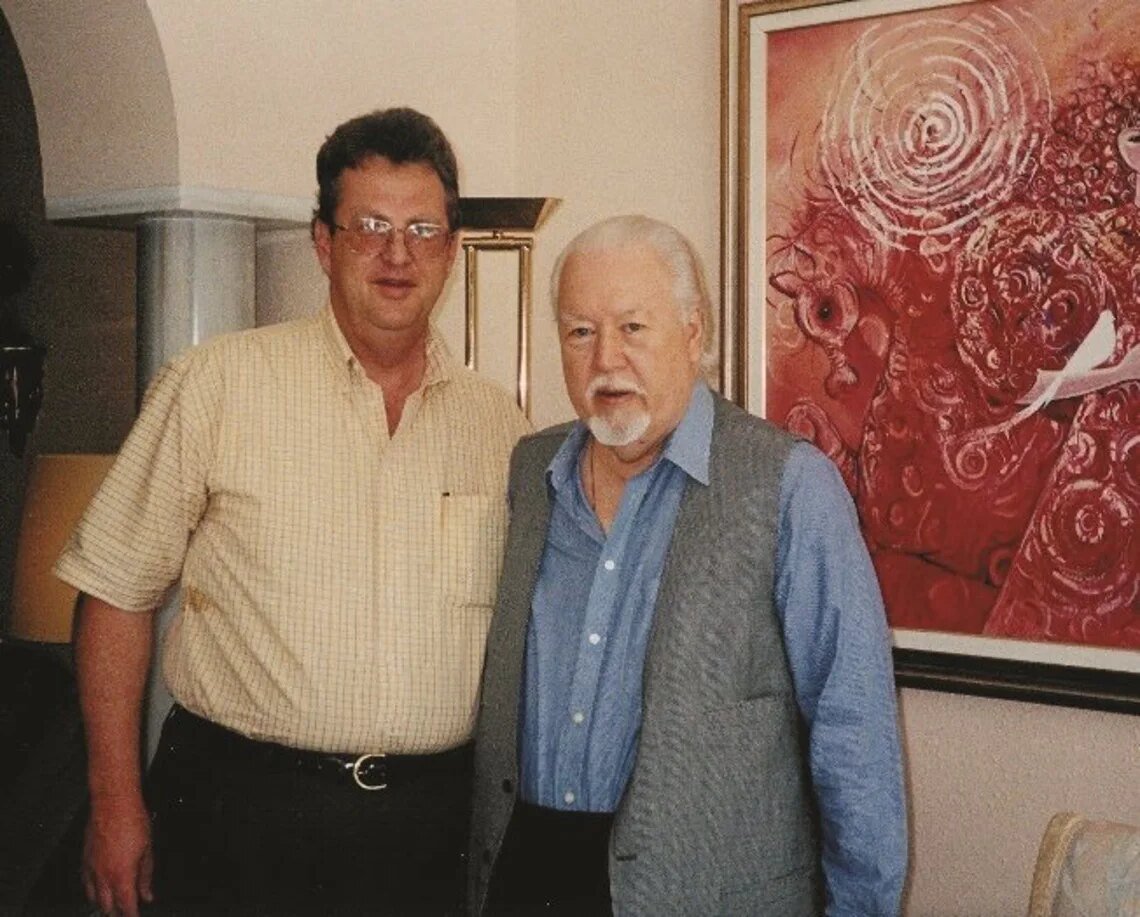 Chris with H.E. Sheikh Kamal Adham in 1998.