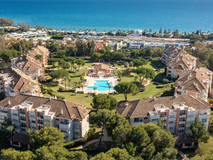 Aerial view of La Trinidad in Marbella with panoramic sea views, showcasing its prime Golden Mile location.