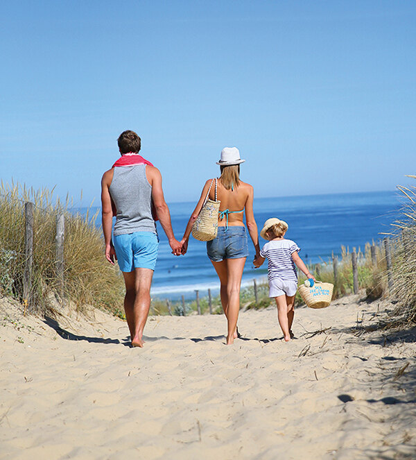 A family on their way to a beach in Marbella.
