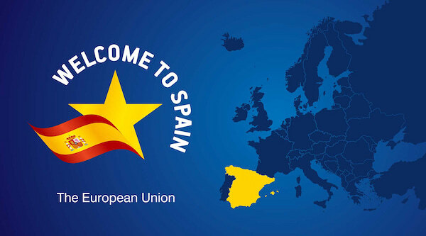 golden visa. Map of Europe with Spain highlighted in yellow and a welcome message reading 