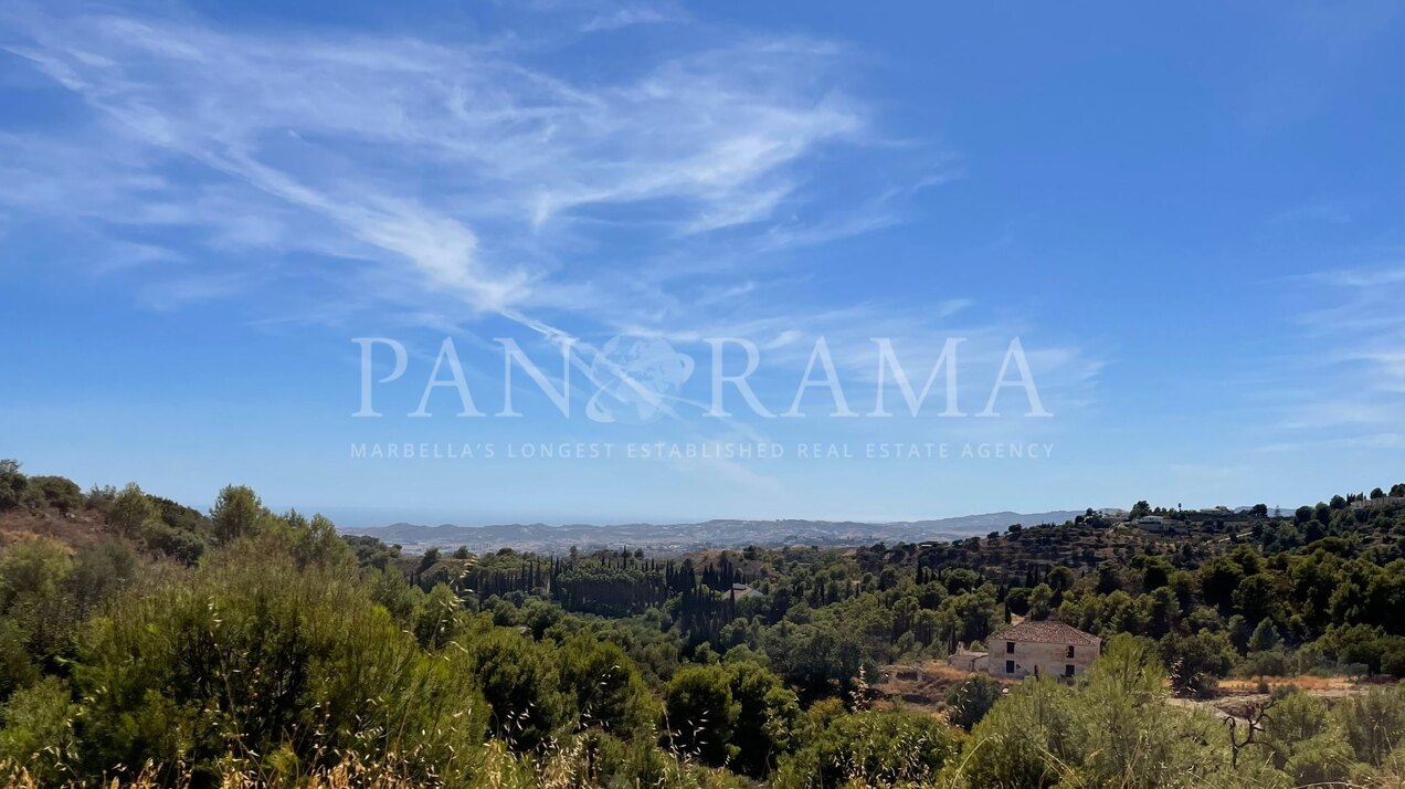 Opportunité d'investissement incroyable : terrain de développement sur le versant de la colline de Mijas avec une vue magnifique