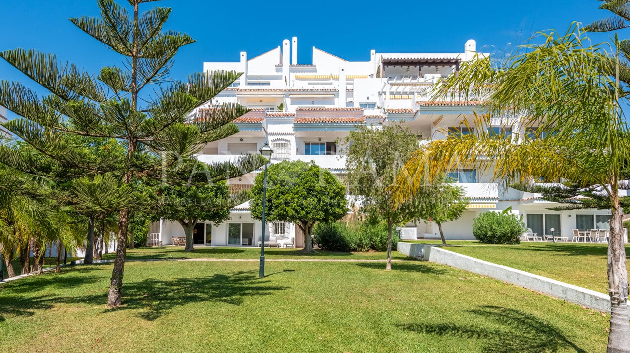 Appartement impeccable au rez-de-chaussée orienté au sud dans les Jardins Royaux