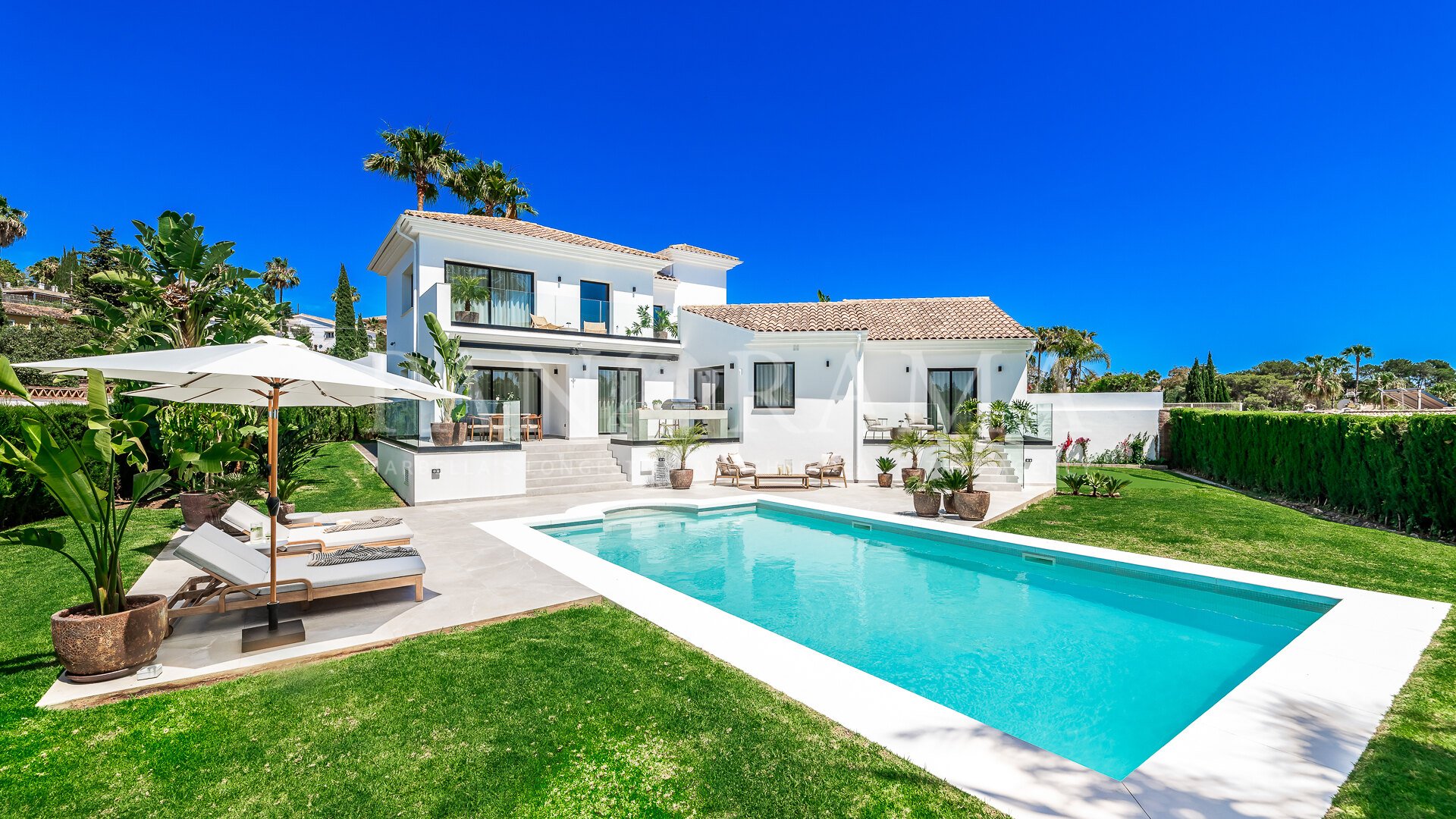 Beautiful villa with stunning views of mountains, the golf course, and the sea