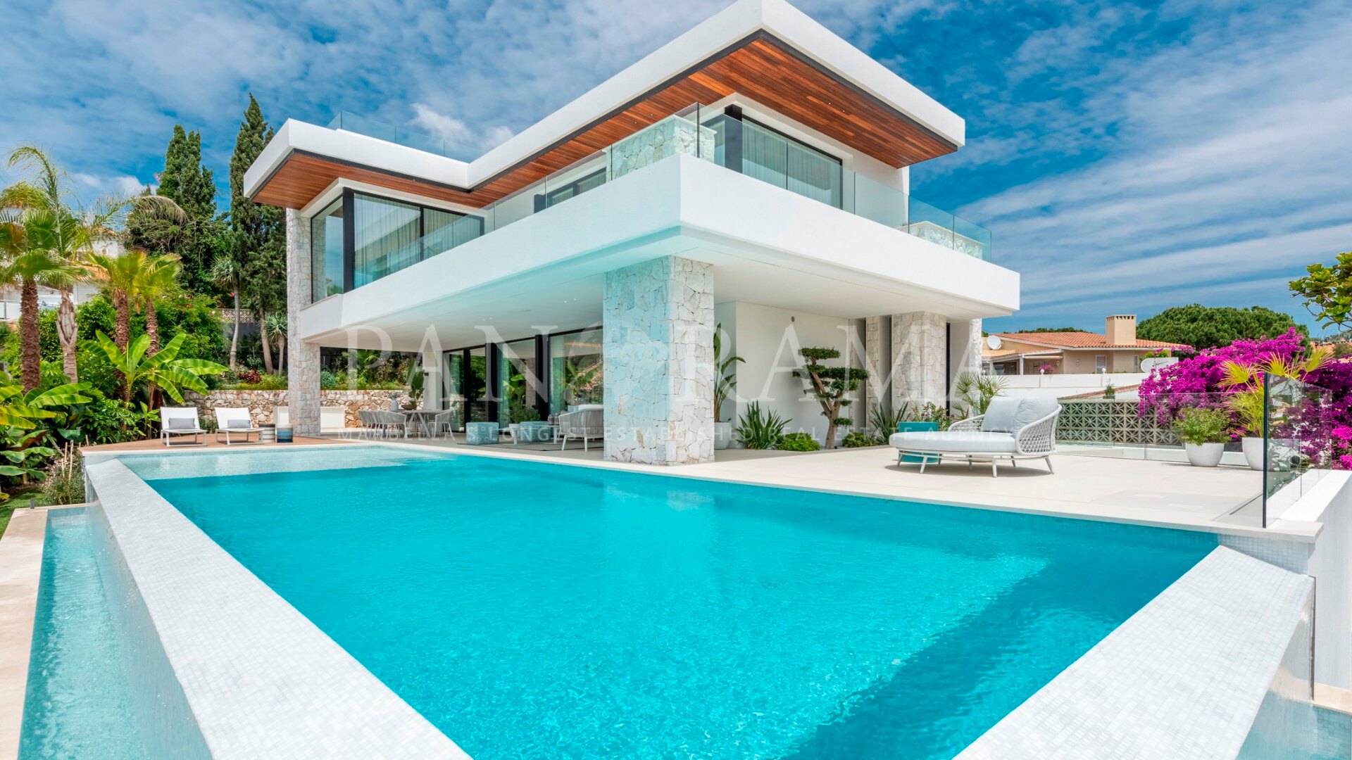 Stunning beachside modern-style villa located in the highly sought-after area of Carib Playa