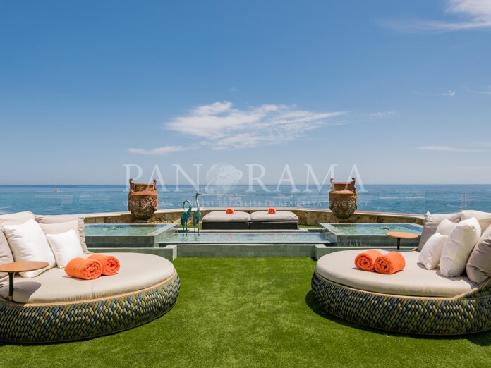 One-of-a-kind beachfront penthouse in the heart of Marbella's Golden Mile and steps to Puerto Banús