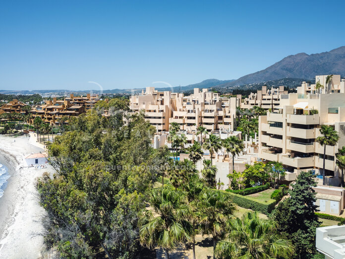 Beachside duplex penthouse within a gated community in Estepona