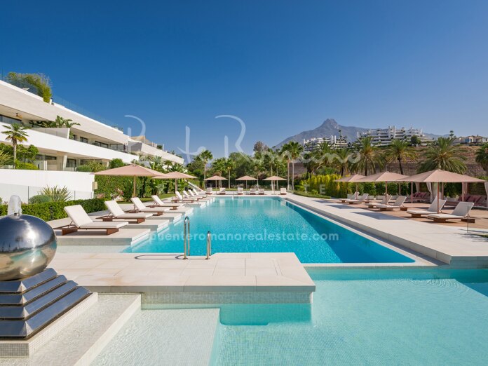 Elegante dúplex en planta baja en EPIC, un complejo cerrado de 5 estrellas en la Milla de Oro
