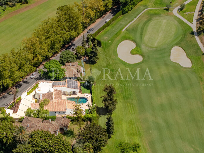 Elegant Ibiza-style villa on the frontline golf in the lower part of Guadalmina Alta