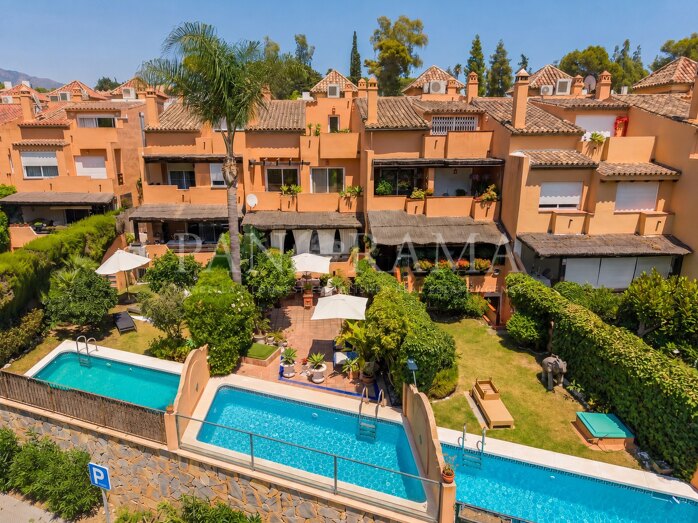 Townhouse with great potential and private pool, steps from Puente Romano, Forum, and the beach