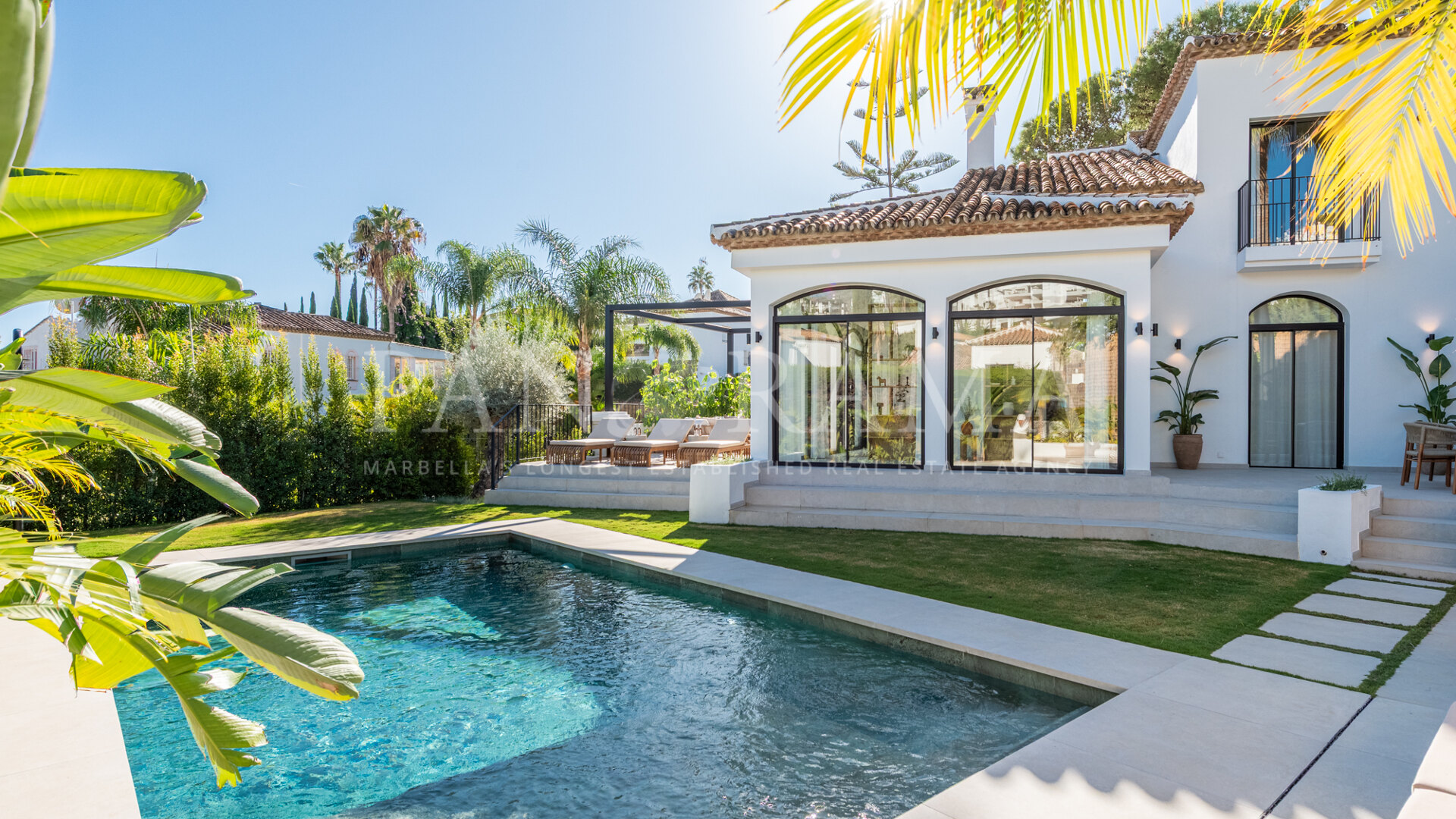 Modern and sleek villa in a gated community in Nueva Andalucía