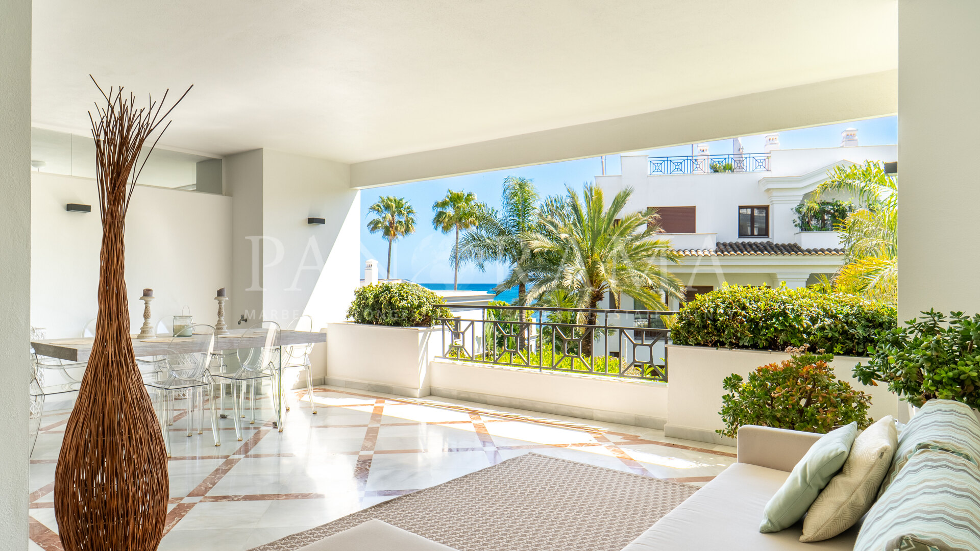 Elegant two-bedroom beachside apartment with partial sea views in Doncella Beach