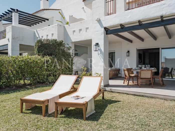 Begane grond appartement met privé tuin in La Quinta Village in Nueva Andalucía