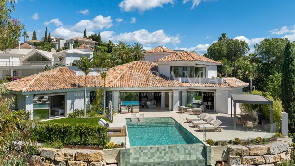 Casa Calma - Andalusische villa met zeezicht en spa in El Herrojo, Benahavís