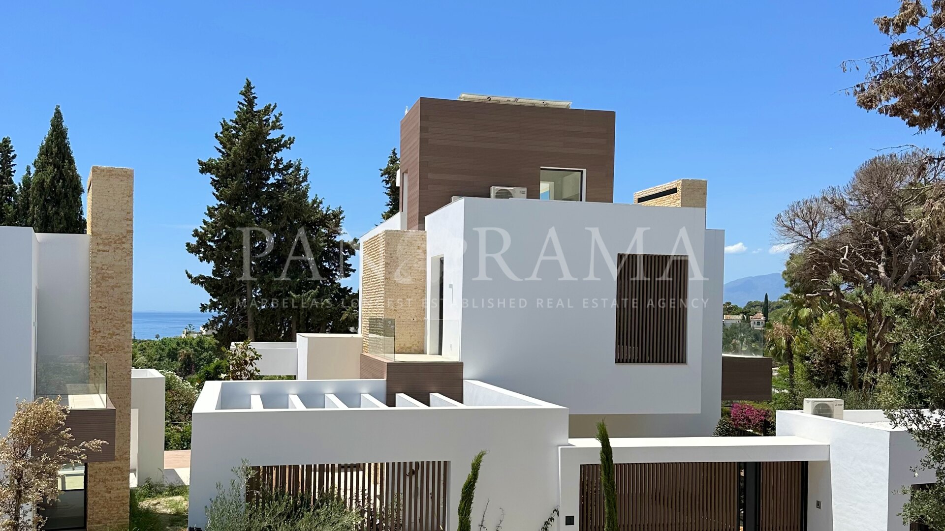 Modern villa in a gated community on the Golden Mile with panoramic sea views