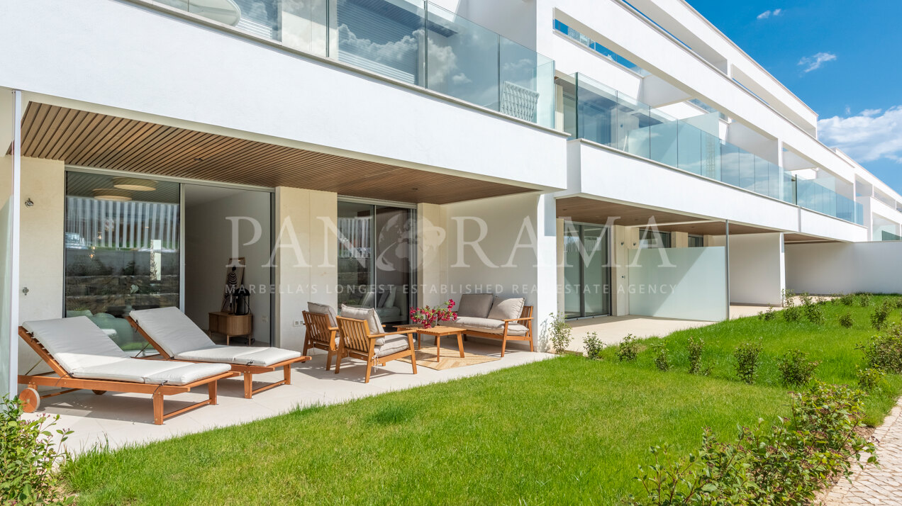 Appartement neuf avec jardin à quelques pas de la plage à Estrella del Mar