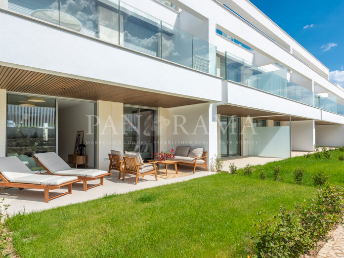 Appartement neuf avec jardin à quelques pas de la plage à Estrella del Mar